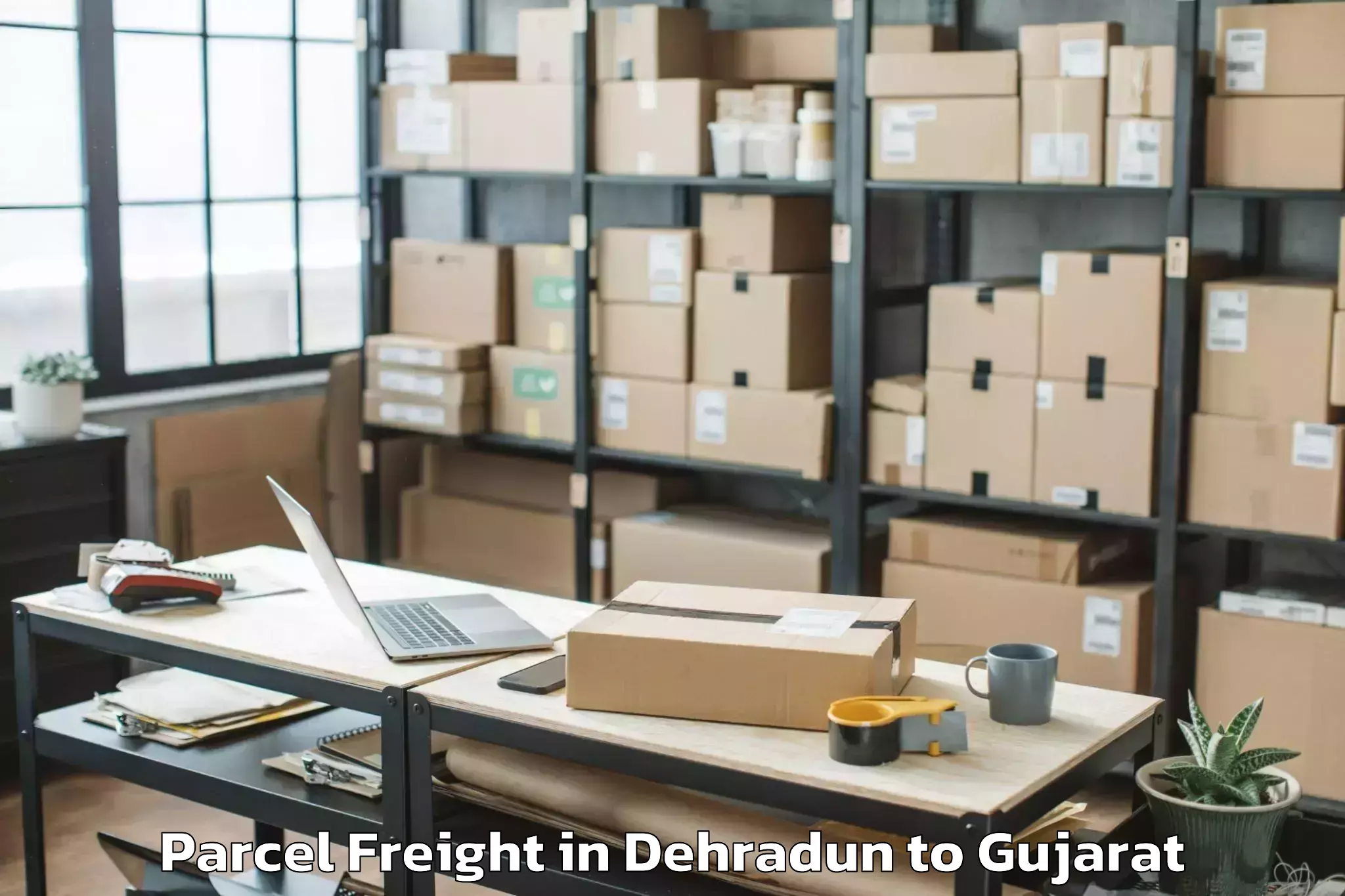 Easy Dehradun to Jasdan Parcel Freight Booking